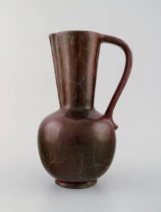 Richard Uhlemeyer, German ceramist. Ceramic jug/vase, beautiful cracked glaze in red shades.: Richard Uhlemeyer, German ceramist. Ceramic jug/vase, beautiful cracked glaze in red shades. Germany, 1940/50s. Measures 25 cm. x 18 cm. In perfect condition. Stamped. Reserve: $294.00 Shipping: Domes