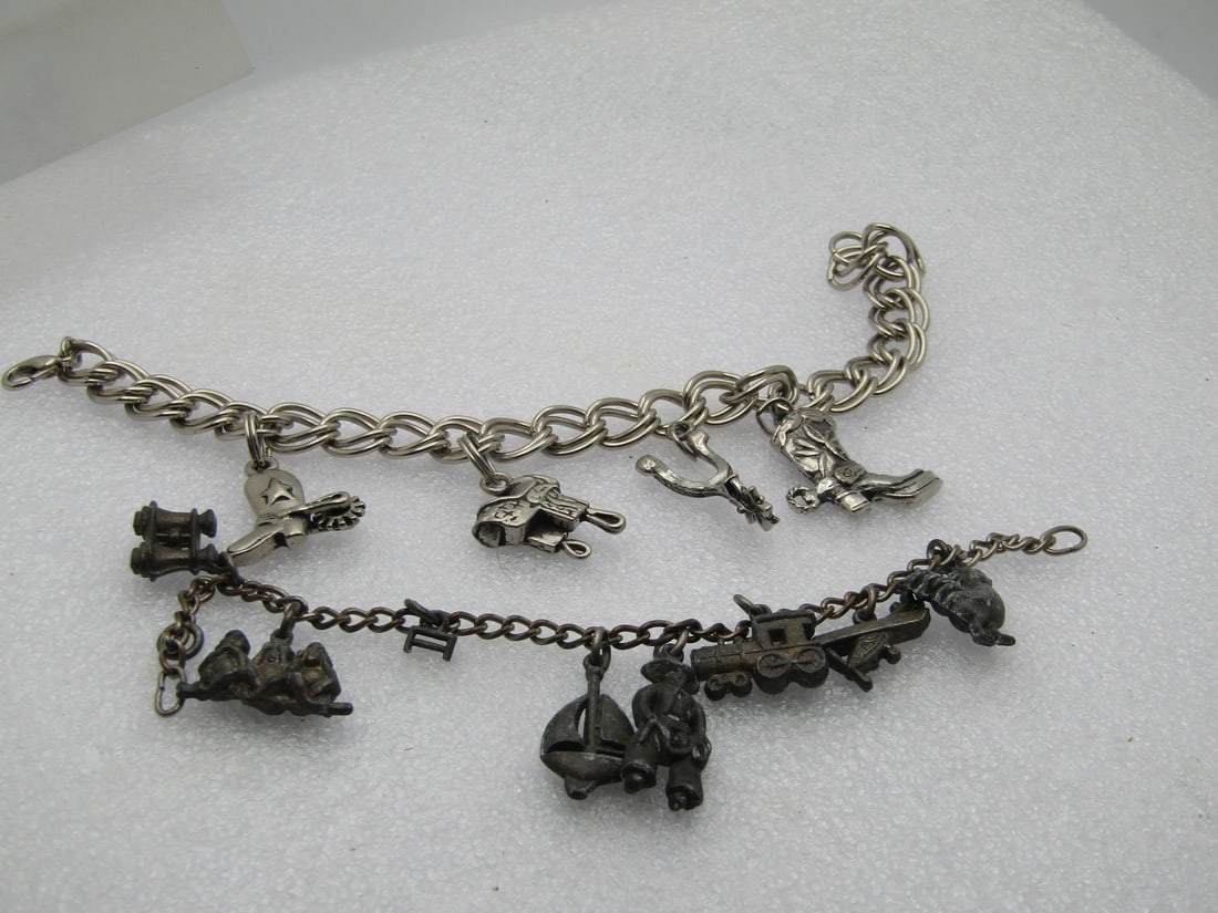 Vintage Pair of Charm Bracelets, Cowboy & Mixed, Costume, 6.5" & 8": Vintage Pair of Charm Bracelets, Cowboy & Mixed, Costume, 6.55" & 8". The 1960's is a mix of charms, sailboat, cowboy, train, airplane, rooster, binoculasr, hear-no-evil - 6.5" and the charms area ppx