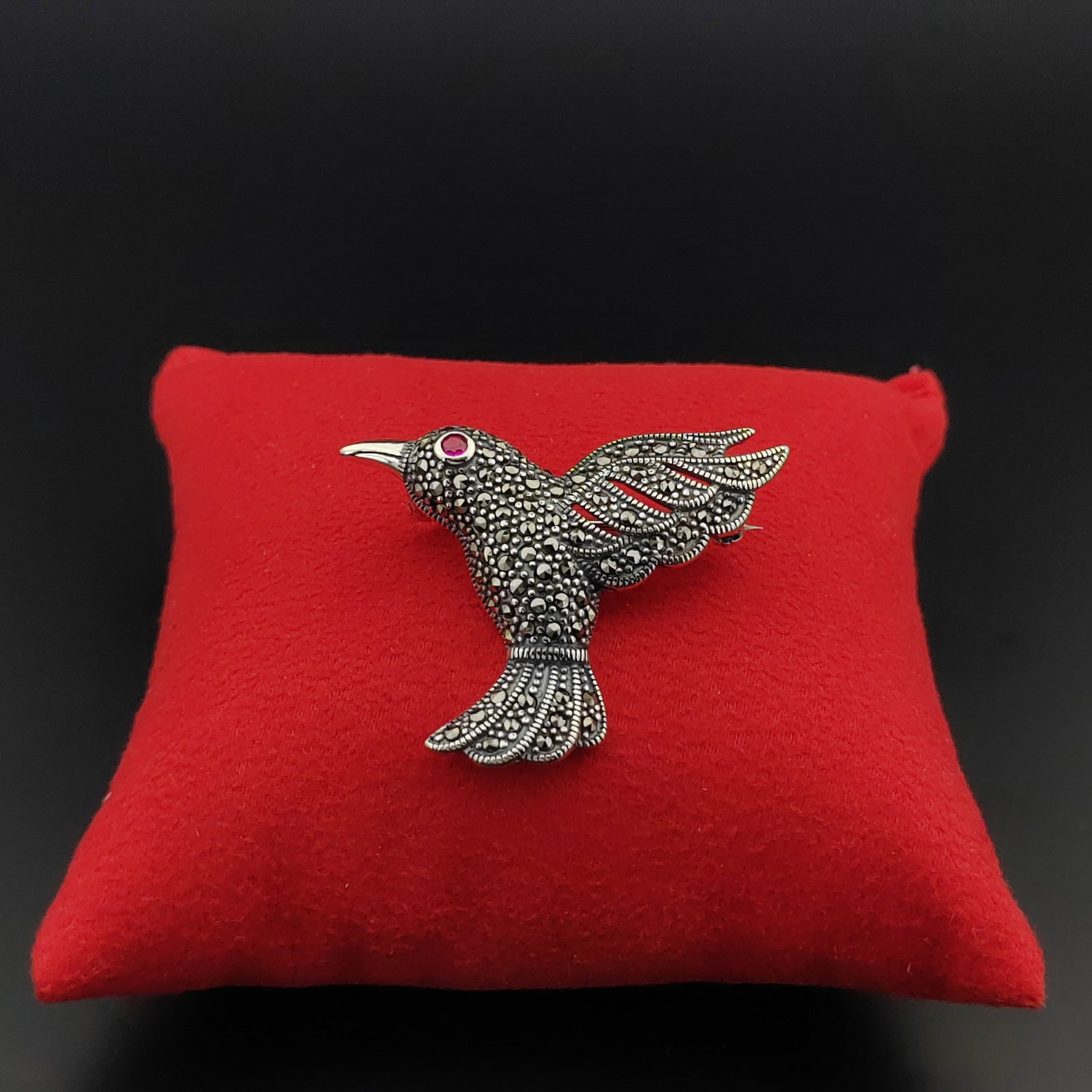 925 Silver Bird Brooch Ornated With Marcasite and Red Zircon: Title: 925 Silver Bird Brooch Ornated With Marcasite and Red Zircon Description: 925 Silver Bird Brooch Ornated With Marcasite and Red Zircon -Condition:New Weight:8.4g Size:1.61x1.29 inch (41x33mm) W