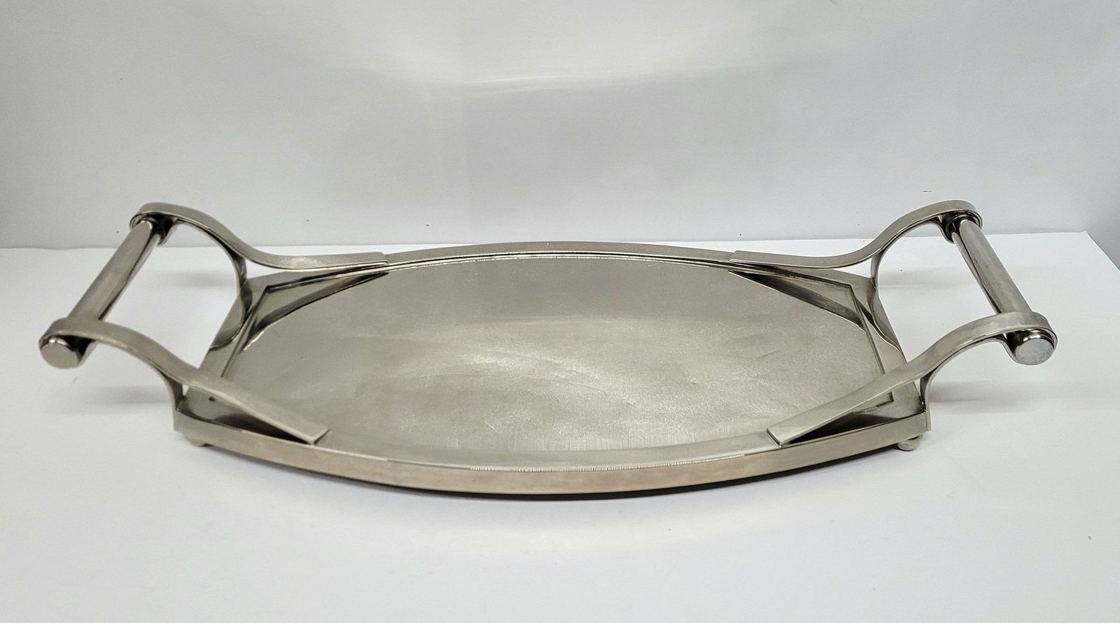 Chrome serving tray, vintage art deco style, vanity, tableware, barware minimalist decor. Debonair: Materials: Metal Chrome serving tray. vintageArt Deco style. This tray would look nice and useful for many areas of your space. Kitchen for holding items to display or use, the bedroom for a vanity, i