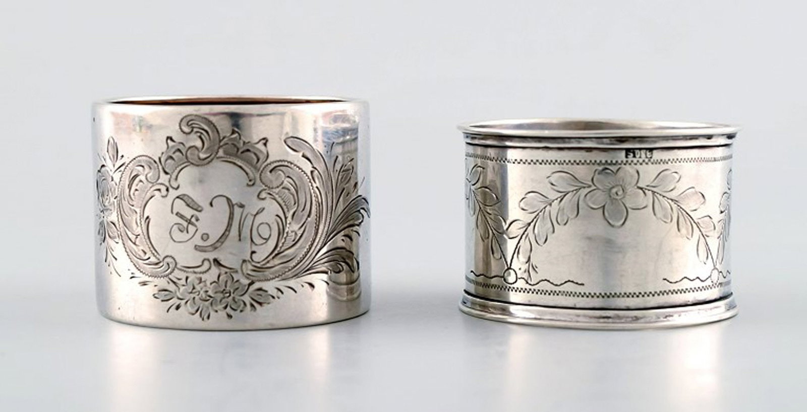 Two Swedish napkin rings in silver. Early 20 th century.: Two Swedish napkin rings in silver. Early 20 th century. Stamped. 826 and 830. In good condition. Measures: Inside diameter: 4.5 cm. Reserve: $70.00 Shipping: Domestic: Shipping rates are determined b