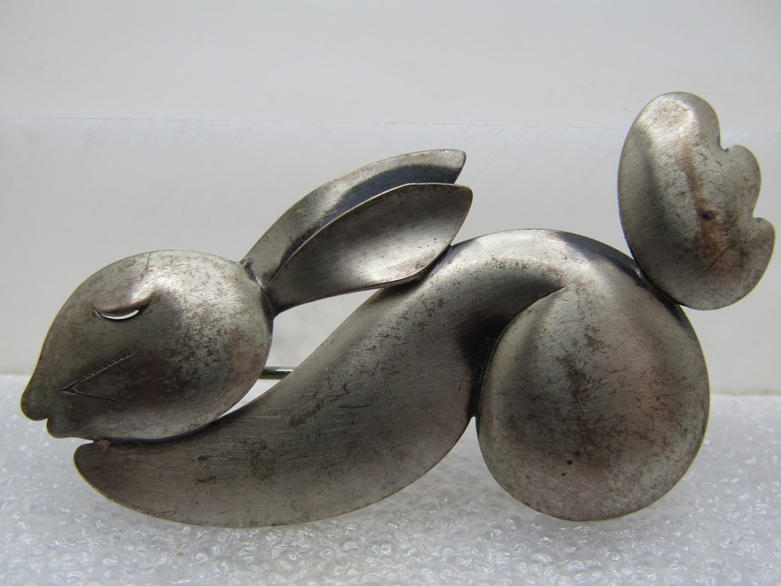 Vintage Sterling Rabbit or Bunny Brooch, Mod, Signed Beau, 1960's-1970s: Vintage Sterling Rabbit or Bunny Brooch, Mod, Signed Beau, 1960's-1970s. The bunny has it's tail up in the air and it's head and front lower than the butt with it's ears back on it's back - mod style.