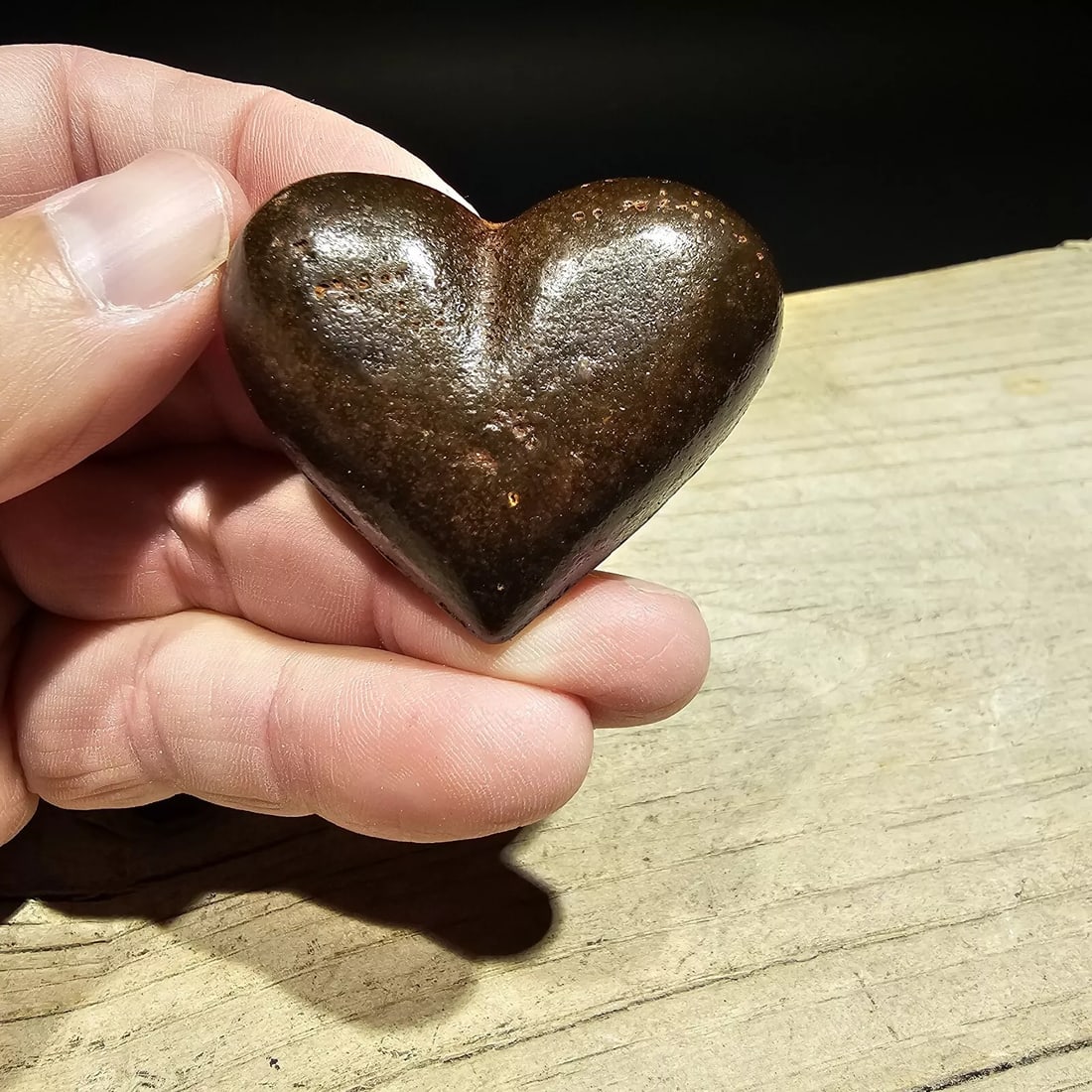 Iron Heart Paperweight: 1 7/8" Wide 1 3/4" tall A wonderful reproduction cast iron heart. Many times the symbol of a heart in an open palm is symbolic of an open welcome or charity. It has also been the symbol of the The Ind
