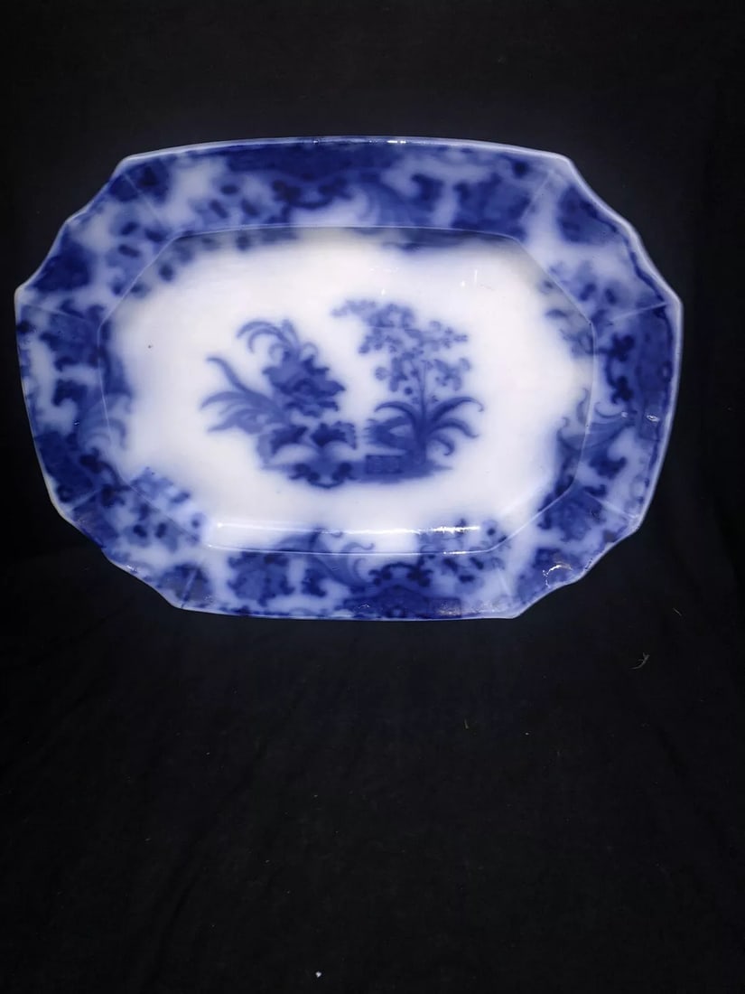 Carlton Flow Blue Platter: It measures 18” x 14 1/4” and is marked. It has no chips, cracks or repairs. Shipping: Domestic: Flat-rate of $25.00 to anywhere within the contiguous U.S. International: Foreign shipping