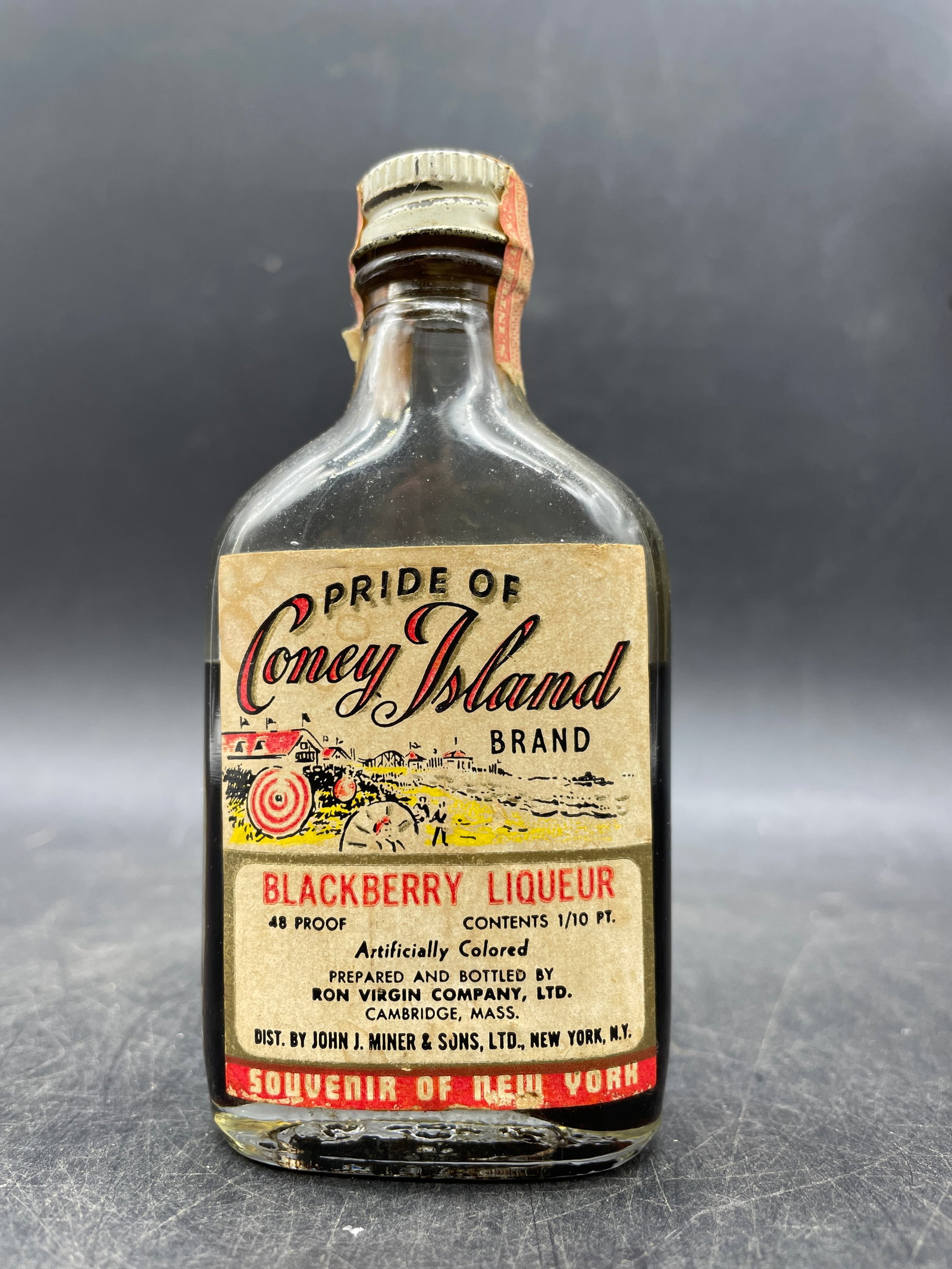Old Pride of Coney Island Blackberry Liqueur Bottle with Tax Seal Great Graphics: Title: Old Pride of Coney Island Blackberry Liqueur Bottle with Tax Seal Great Graphics Date/Period: unknown Dimension: Approx. 4" Material: glass Additional Information: I am selling this decorative 