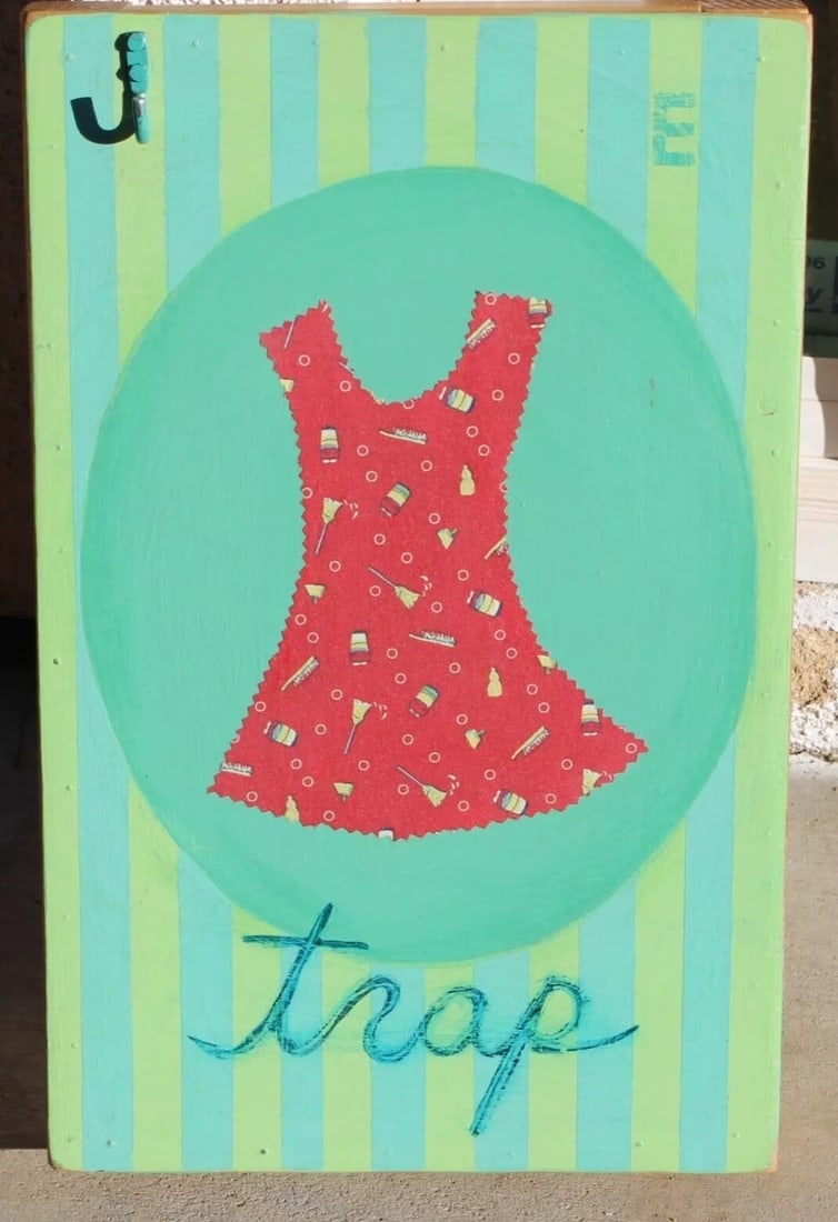 ELIZABETH R. HOFFMAN Enamel & Collage Dress & a Hook "TRAP" 2000 Was $550: ELIZABETH R. HOFFMAN. Trap 2000. Features the word Trap at Bottom, a Dress in the Center and a real Hook protruding at the top left of the painting. This work is enamel and fabric collage on wood, siz