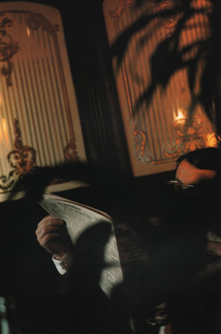 RALPH GIBSON - Reading the News: Artist: RALPH GIBSON Print Title: Reading the News Printing Date: 1990’s Medium: Photo-lithograph Printed in:Italy Image Size: 10 x 7” Ralph Gibson (1960–1962) an American art photog