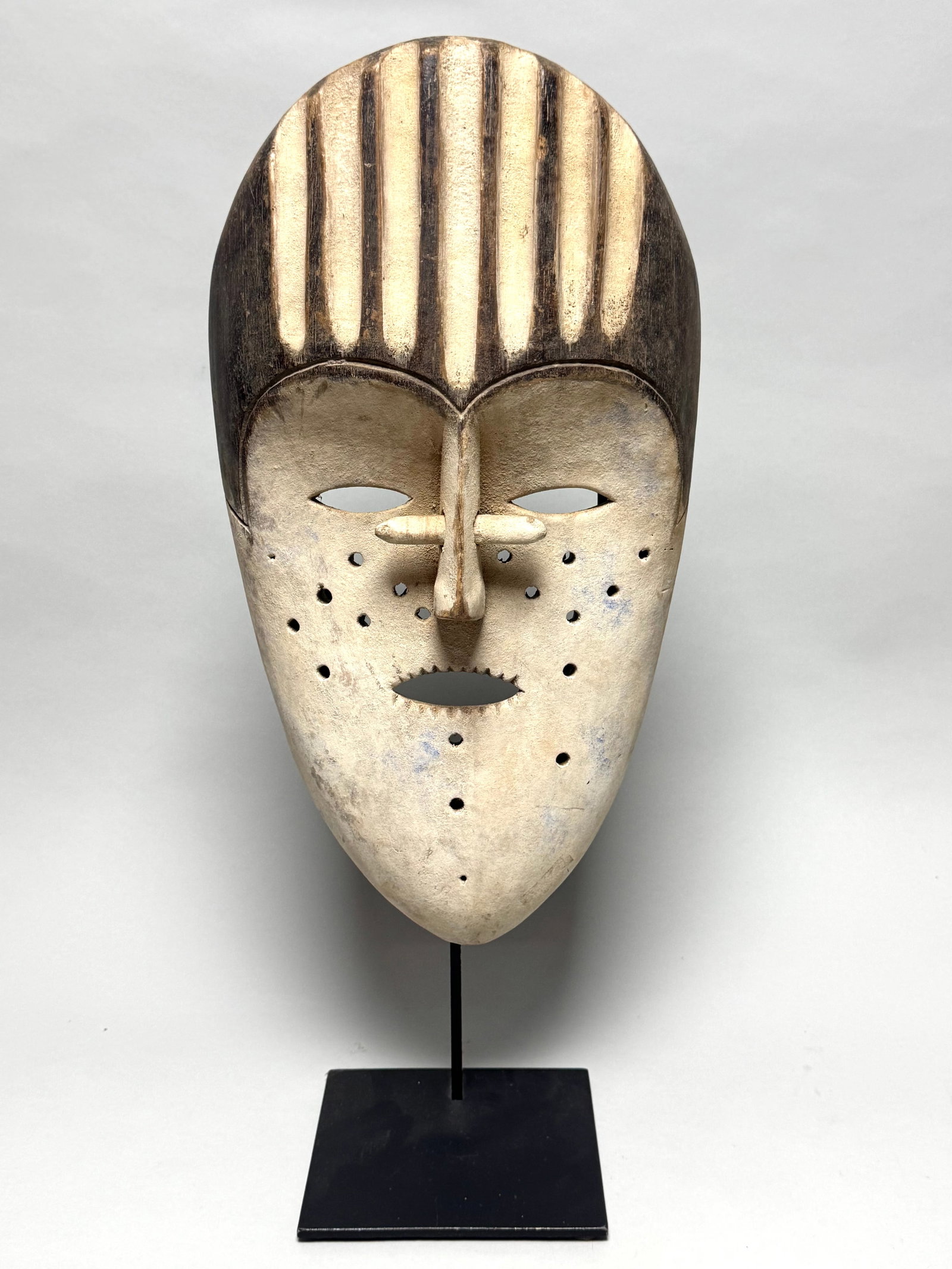 Fang - Ngil mask - Gabon, Africa: These masks were used by the male NGIL society that no longer exists today. This secret society was responsible for the initiation and they fought against witchcraft. The Ngil had a ritual purifying f