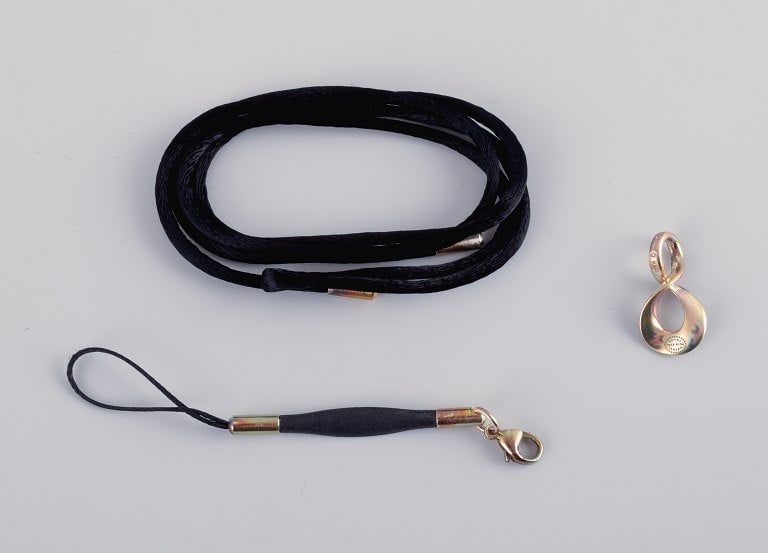 Regitze Overgaard for Georg Jensen. Infinity. Pendant in sterling silver with matching silk cord.