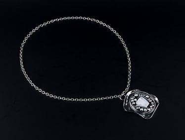 Jacob Hull, Danish jeweller. Necklace with pendant. Unique work, silver-plated metal adorned with