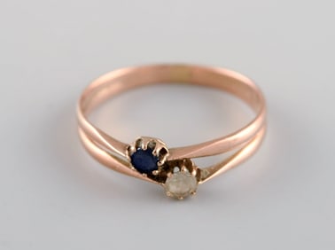 Scandinavian jeweler. Ring in 14 carat gold adorned with blue and clear semi-precious stones. 1930s.