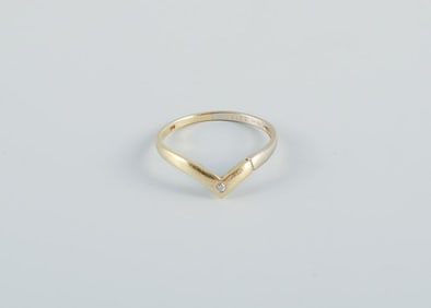 Scandinavian goldsmith. Modernist gold ring adorned with brilliant. Stamped with the goldsmith's