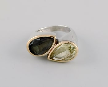 Daniel Swarovski, Paris. Large ring in silver and 18 carat gold adorned with two semi-precious
