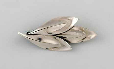 Danish modernist brooch in sterling silver in the form of leaves. 1960's.