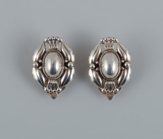 A pair of Georg Jensen ear clips in sterling silver. Jewelery of the year 2000.
