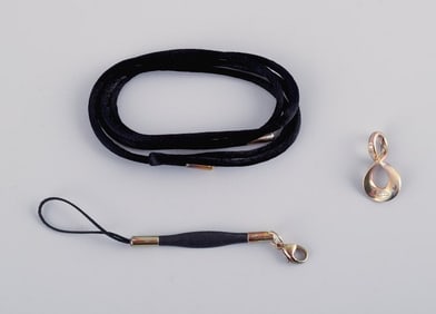 Regitze Overgaard for Georg Jensen. Infinity. Pendant in sterling silver with matching silk cord.