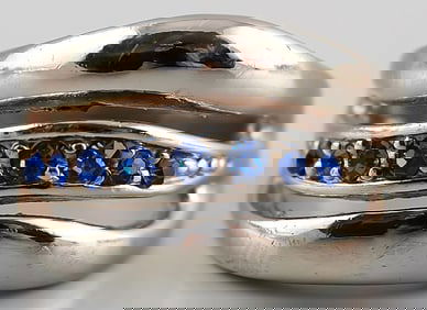 Silver ring with blue stones.