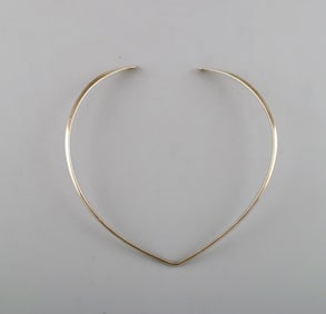 N.E. From sterling silver neck ring. Danish design 1970's.