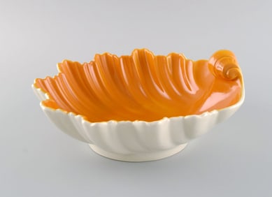 Wilhelm Kåge (1889-1960) for Gustavsberg. Hand-painted faience bowl shaped like a seashell.
