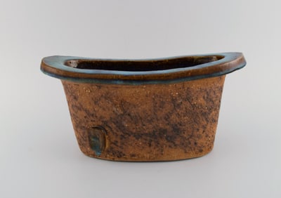 Curt M. Addin (1931-2007) for Glumslöv. Large freeform vase in partially glazed stoneware.