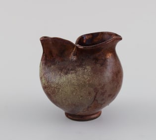 European studio ceramist. Small unique vase / jug in glazed stoneware. Beautiful luster glaze. 1960s