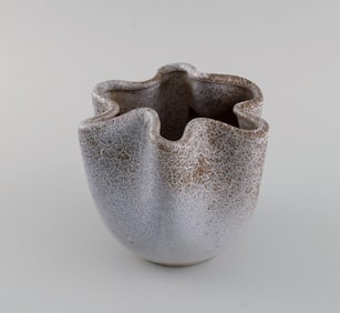 European studio ceramicist. Unique wavy edged vase in glazed stoneware. Beautiful speckled glaze.