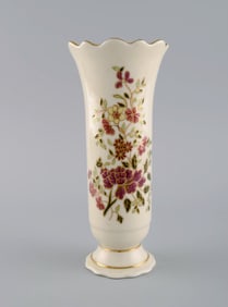 Zsolnay vase in cream-colored porcelain with hand-painted flowers and gold decoration. Late 20th
