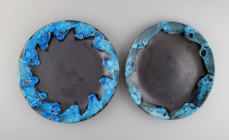 French ceramist. Two round serving dishes in glazed stoneware. Beautiful glaze in azure shades.
