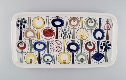 Marianne Westmann for Rörstrand. Large dish in hand-painted stoneware. Colorful Swedish design.