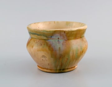 European studio ceramicist. Unique vase in glazed ceramics. Beautiful glaze in sand shades. Mid-20th