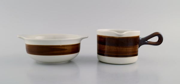 Hertha Bengtson (1917-1993) for Rörstrand. Koka bowl and sauce jug in glazed stoneware. 1960s.