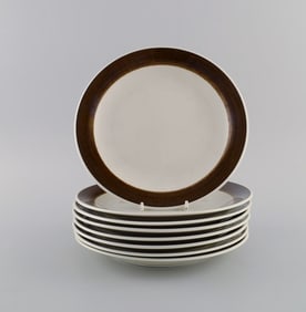Hertha Bengtson (1917-1993) for Rörstrand. Eight Koka lunch plates in glazed stoneware. 1960s.