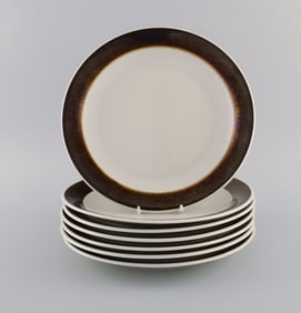 Hertha Bengtson (1917-1993) for Rörstrand. Seven Koka dinner plates in glazed stoneware. 1960s.