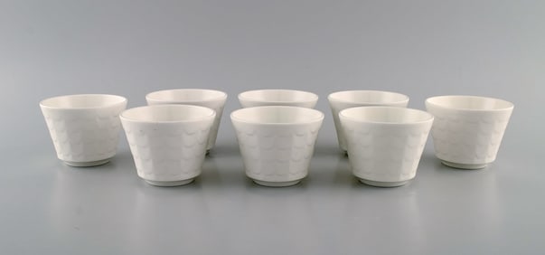 Wilhelm Kåge for Gustavsberg. Eight herb pots in white glazed porcelain. Swedish design, 1960s.