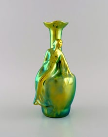 Zsolnay art nouveau vase in glazed ceramics modeled with sitting woman. Beautiful luster glaze. 20th