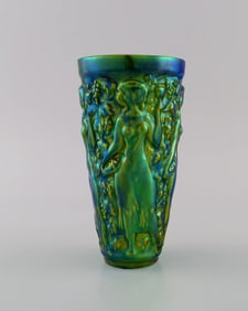 Zsolnay vase in glazed ceramics modeled with women picking grapes. Beautiful luster glasses.