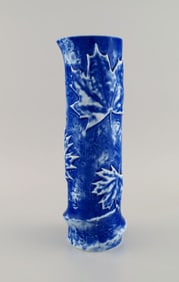 European studio ceramicist. Cylindrical vase in glazed ceramic decorated with maple leaves.