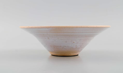 Danish studio ceramicist. Unique bowl in glazed stoneware with hand-painted flower. Late 20th