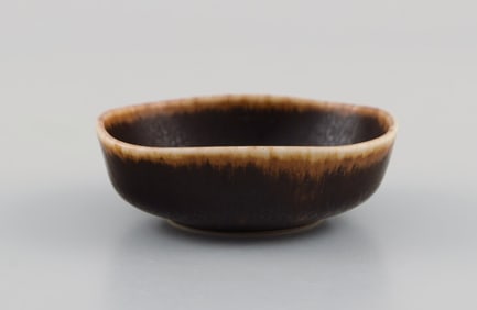 Eva Stæhr-Nielsen for Saxbo. Miniature bowl in glazed stoneware. Beautiful glaze in brown