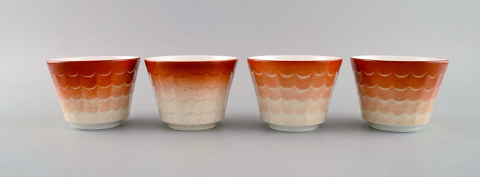 Wilhelm Kåge for Gustavsberg. Four flower pot covers in porcelain. Swedish design, 1960s.