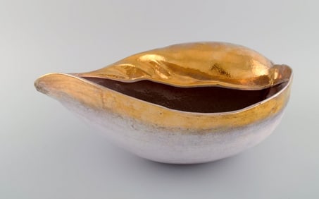 European studio ceramicist. Large unique sculpture designed as a conch in glazed ceramics. Beautiful