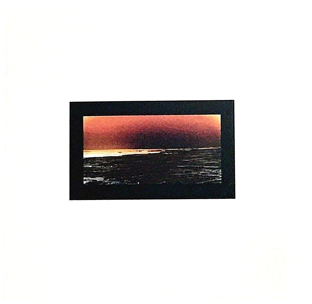 Andro Wekua: Sunset 2011: Artist: Andro Wekua Title: Sunset 2011 Medium: Color photograph, ed. 100 Framed Dimension: 12" x 12" Additional Information:Color photograph signed and numbered verso Reserve: $200.00 Shipping: Domest