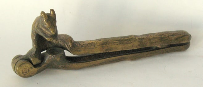 Antique cast brass squirrel nut cracker.