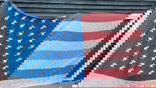 Huge commercial American Flag 50 Star . Industrial material faded