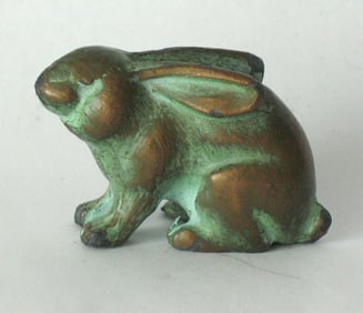 Antique cast brass rabbit paper weight.
