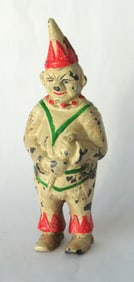 Antique cast iron toy clown penny bank.