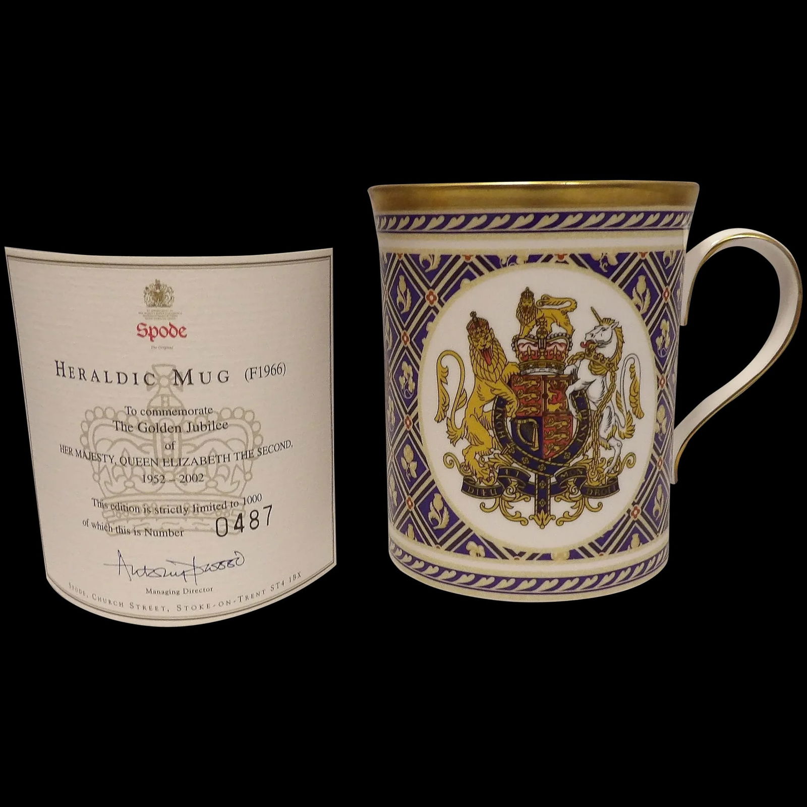 Spode Coffee Cup Commemorating the Golden Jubilee of Queen Elizabeth II 1952-2002 Limited Edition: Spode coffee cup (blue heraldic) to commemorate the golden jubilee of her majesty, Queen Elizabeth the second 1952- 2002, this is strictly limited to 1000 of which this is number 487. Measures 3 ¾