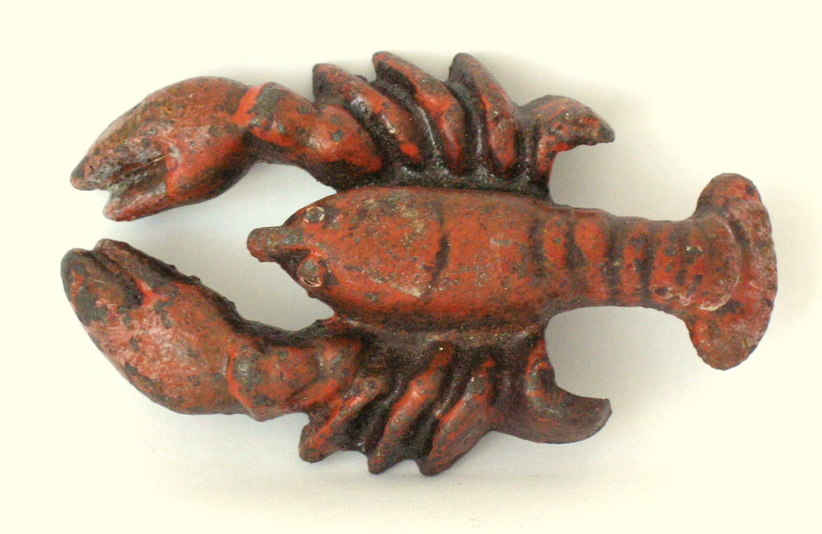 Antique cast iron Maine lobster bottle opener.: Title: Antique cast iron Maine lobster bottle opener. Date/Period: 1950's Dimension: 3 1/2” long Additional Information: Nice antique cast iron Maine lobster bottle opener in original paint, pat
