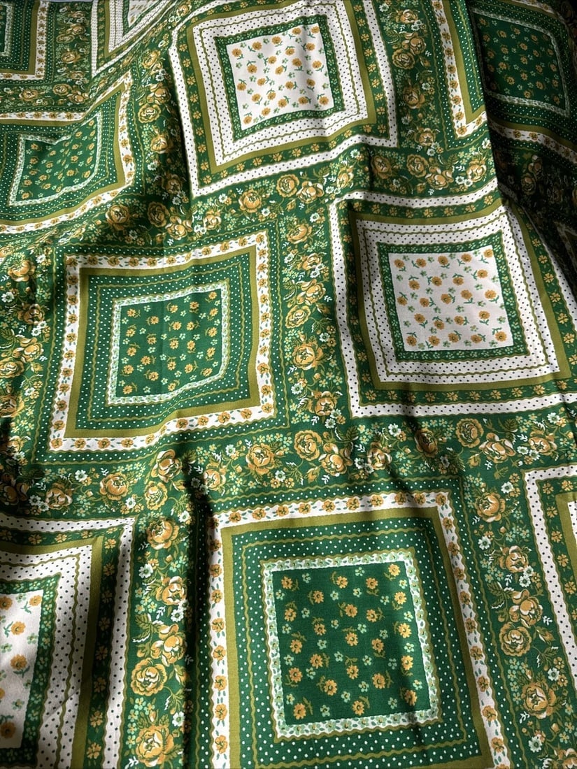 1970s vintage fabric green and yellow squares 46 X61 Inches: This vintage fabric from the 1970s features a retro pattern of green and yellow squares, measuring 46 by 61 inches. The material is made of high-quality fabric, perfect for collectors and enthusiasts