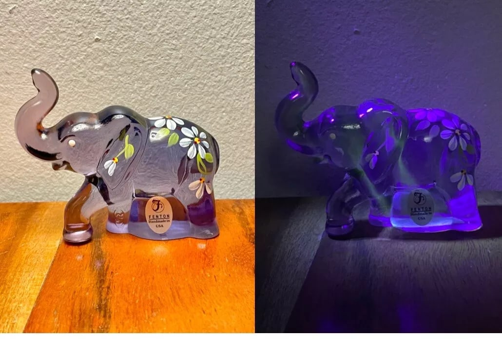 FENTON-LENOX Uranium ‘Lucky, The Little Lavender Elephant’ 3.25” Figurine Signed: This vintage Fenton art glass figurine features a lavender-colored elephant named Lucky, standing at 3.25 inches tall and 3.5 inches long. Hand-painted and signed by the artist, it also glows under UV